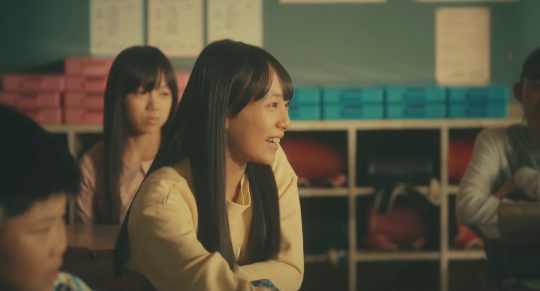 暗い表情の園子